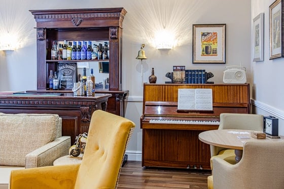 St Martin's Court Care Home - Drinks bar and wooden piano