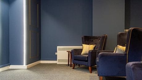 Quarry Hall Care Home - Blue sitting area, armchairs
