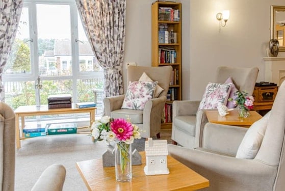 Greenways Court Care Home - Pink flower wooden table