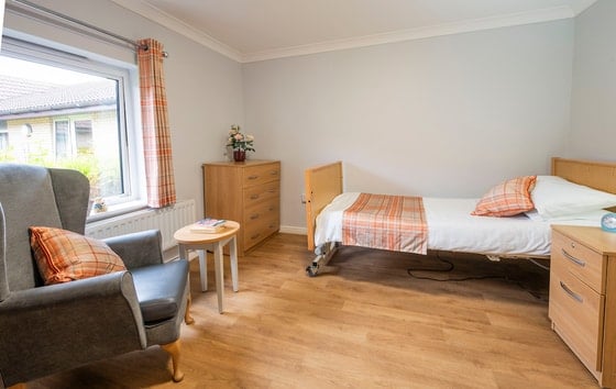 Ailsa Craig Care Home - Single white clothed bed