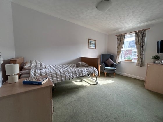 Cold Springs Park Care Home - Senior living striped bed