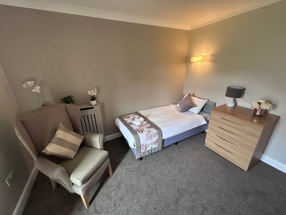 Winters Park Care Home - Single bed with white covers