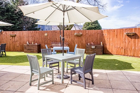 Meadowlands Care Home - Outdoor seating wooden
